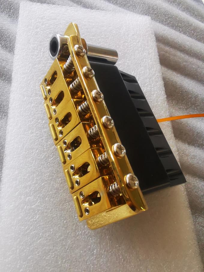 Guitar piezoelectric bridge power bridge